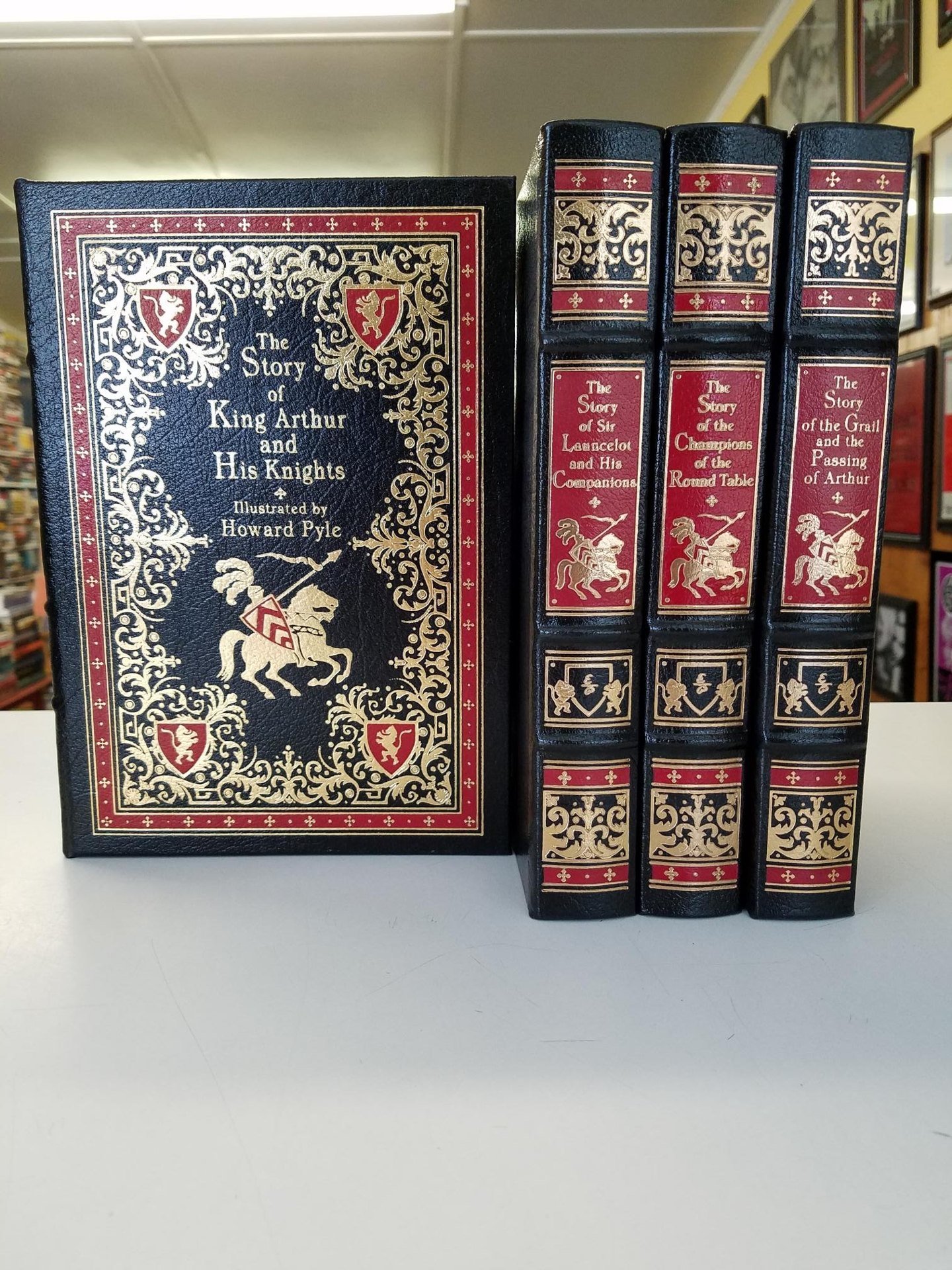 Leather-bound gilt sets on the shelf