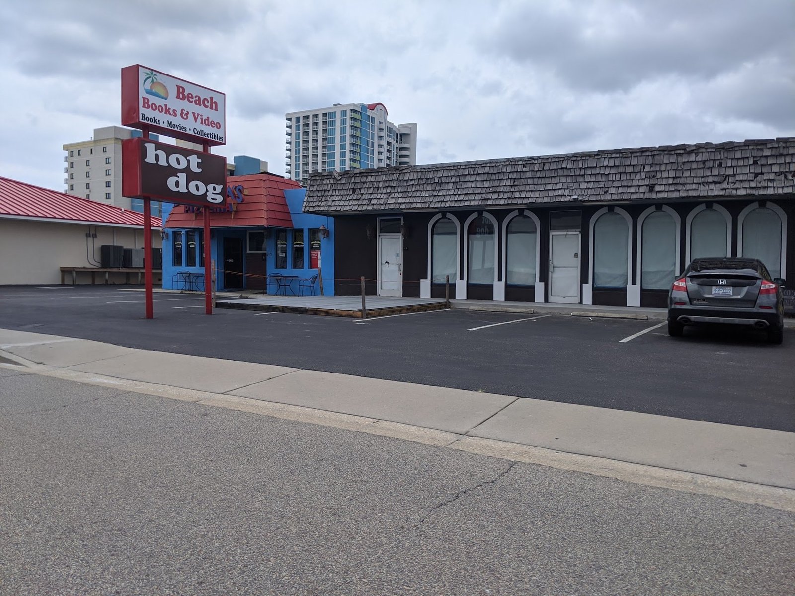 Sea Mountain Highway plaza with the Beach Bookshop sign